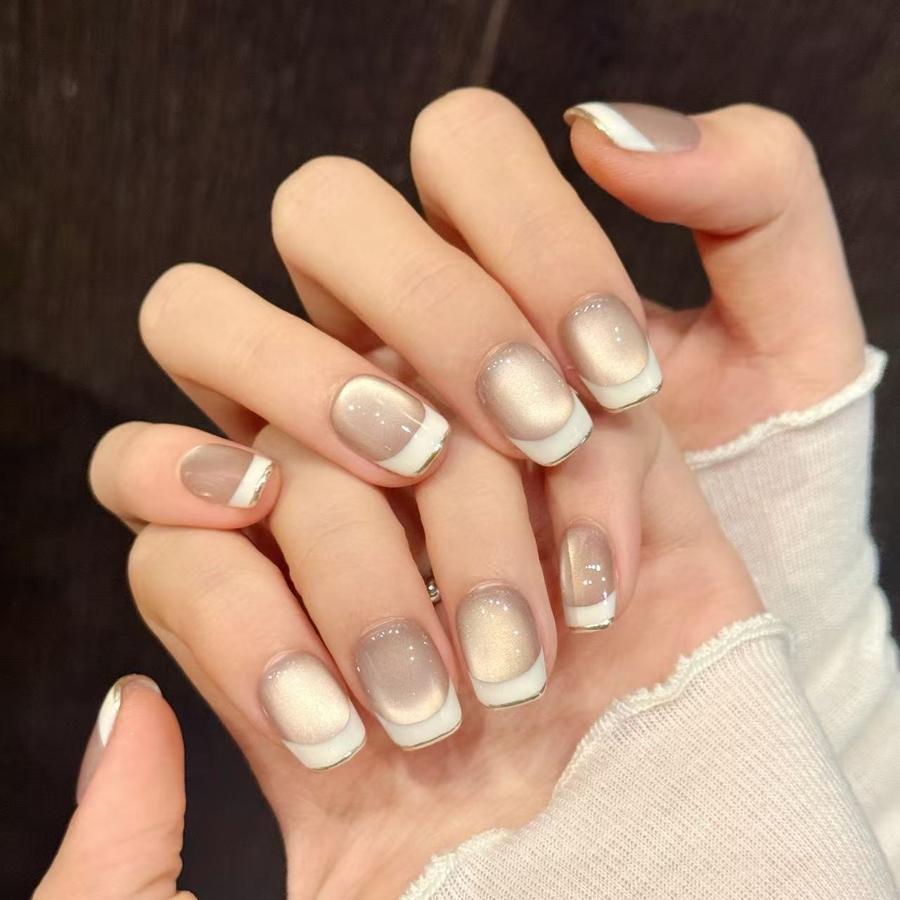 Skin-flattering nude glass-bead cat eye, white-edge French short press-on nails